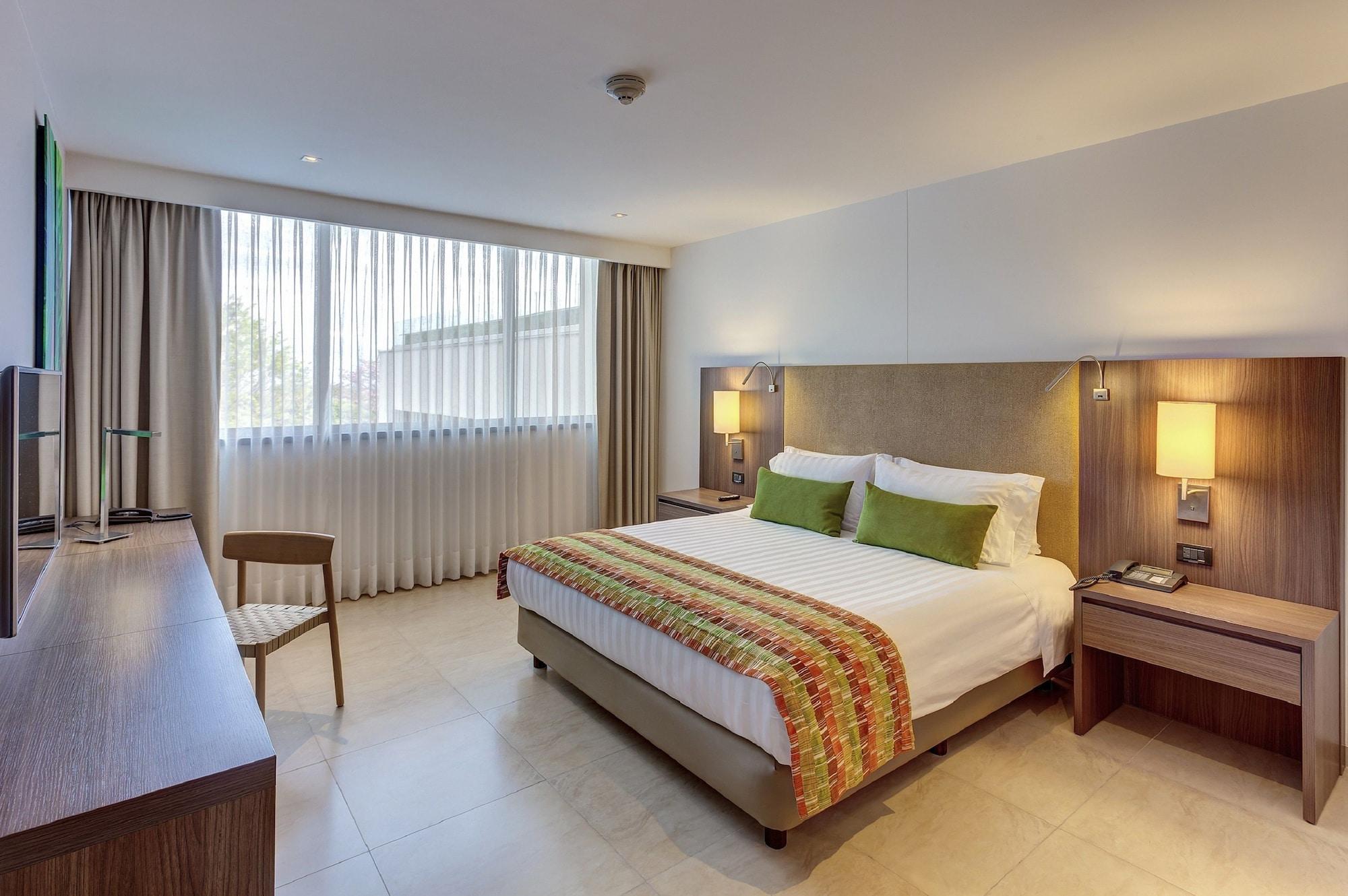 Estelar Villavicencio Hotel & Centro De Convenciones Exterior photo A bedroom at the hotel