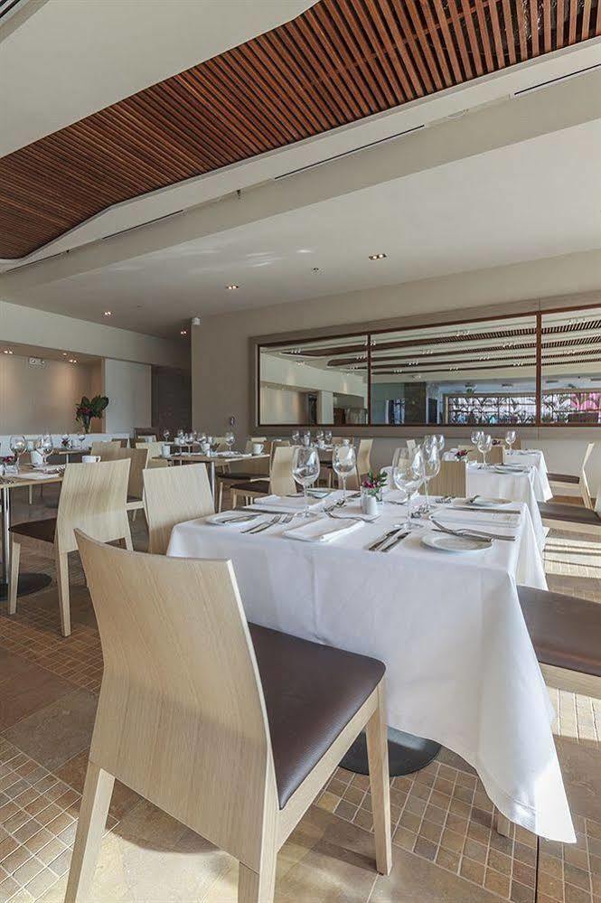 Estelar Villavicencio Hotel & Centro De Convenciones Exterior photo The interior of the restaurant